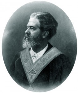 Retrato histórico del co-fundador de Le Droit Humain, en blanco y negro de Georges Martin, médico y masón francés, con banda masónica sobre el pecho.